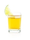 Shot of gold tequila with lime slice Royalty Free Stock Photo