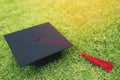 Shot of graduation hats on the grass, concept during commencement success graduates of the university,Concept education congratula