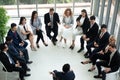 Shot of a group of businesspeople having a discussion in seminar at office