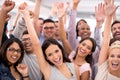 End of year party Woohoo. Shot of a group of smiling businesspeople raising their hands. Royalty Free Stock Photo
