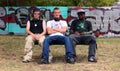 Thats how we roll. Shot of a group of young urban teenagers sitting together on a bench outside. Royalty Free Stock Photo