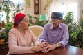 Shot of a happy elderly asians couple sitting at home and talking