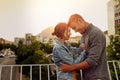 My heart belongs to you. Shot of a happy young couple enjoying a romantic moment in the city. Royalty Free Stock Photo