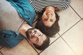 Were going to make our new home a happy one. Shot of a happy young couple relaxing on the floor of their new home. Royalty Free Stock Photo