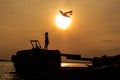 Little boy flying a kite at sunset, Viet Nam Royalty Free Stock Photo