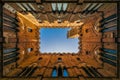 Siena palazzo pubblico seen from the inside against the sky