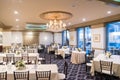 Shot of interior design of the bright and decorated dining area of the wedding hall