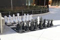A shot of a large black and white chess set on the sidewalk at Atlantic Station Royalty Free Stock Photo
