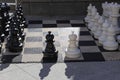 A shot of a large black and white chess set on the sidewalk at Atlantic Station Royalty Free Stock Photo