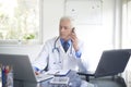 Male doctor making call Royalty Free Stock Photo