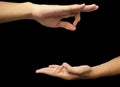 Shot of a male hand demonstrating Jnana Mudra or Wisdom mudra isolated on black background Royalty Free Stock Photo