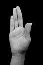 Shot of male hands isolated on black background demonstrating Kalesvara mudra. Royalty Free Stock Photo