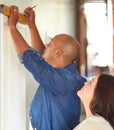 He knows his spirit level. Shot of a married couple doing some improvements on their home. Royalty Free Stock Photo