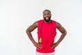 Shot of masculine man skipping rope. Muscular young man exercising with jumping rope against grey background