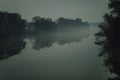 Shot of misty river surrounded by forest