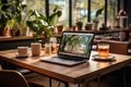 A shot of a modern workspace with a laptop and a coffee cup Royalty Free Stock Photo