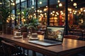 A shot of a modern workspace with a laptop and a coffee cup Royalty Free Stock Photo