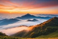 Mountain cloud and foggy at morning time with orange sky, sunrise beautiful landscape Royalty Free Stock Photo