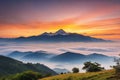 Mountain cloud and foggy at morning time with orange sky, sunrise beautiful landscape Royalty Free Stock Photo