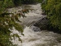 shot of a mountain stream swollen with water due to heavy rains Royalty Free Stock Photo