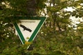 Shot of a nature revere sign on a tree