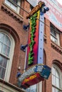 A shot of the neon sign outside of Margaritaville restaurant and bar along Broadway street on a cloudy day in Nashville Tennessee