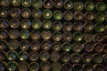 Shot of numerous empty glass wine bottles placed on top of each other Royalty Free Stock Photo