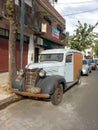 Vintage old rusty 1938 Chevrolet Chevy panel delivery van parked in the street