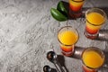 Shot with orange taste, tasty citrus shot concept