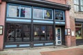 A shot outside of the Tin Roof bar along Broadway street on a cloudy day in Nashville Tennessee