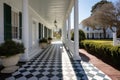 shot of a paved walkway leading to a greek revival porch