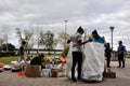 Shot of people sorting garbage from the Parana river in Rosario, Argentina