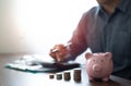 Shot of pink piggy bank with money stack step up growing growth. Royalty Free Stock Photo