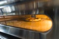shot of pizza baking in an electric oven, restaurant concept, italian cuisine Royalty Free Stock Photo