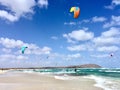 Shot of power kites on the scenic beach, kiteboarding or kitesurfing for extreme lovers