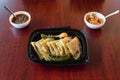 Shot of quesadillas with roasted jalapeno and onion accompanied with salsa and baked beans