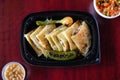 Shot of quesadillas with roasted jalapeno and onion accompanied with salsa and baked beans