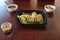 Shot of quesadillas with roasted jalapeno and onion accompanied with salsa and baked beans