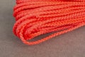 shot of red rope for sport texture background, coiled industrial rope made of nylon or synthetic