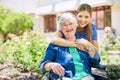 Ive got a great relationship with all my patients. Shot of a resident and a nurse outside in the retirement home garden. Royalty Free Stock Photo