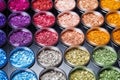 shot of rows of unpressed vibrant eyeshadow pellets