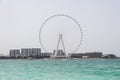 Shot from the sea overlooking Dubai ferris wheel Royalty Free Stock Photo