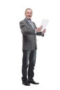 Shot of a senior professional man holding papers in his hand and doing some paperwork Royalty Free Stock Photo