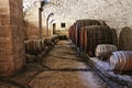Barrels of wine in the Buonconsiglio castle of Trento in northern Italy Royalty Free Stock Photo