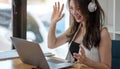 Shot of smiling businesswoman looking at camera webcam make conference business group call, online training concept Royalty Free Stock Photo