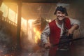 Joyful pirate with saber and pistol on burning ship