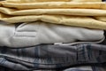 shot of Stack of folded cotton clothes in horizontal frame