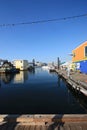 A shot taken of float homes in a harbour.