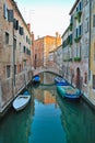 Venetian canal street and a bridge
