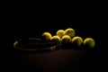 A shot of a tennis racket and a tennis ball. Neural network AI generated Royalty Free Stock Photo